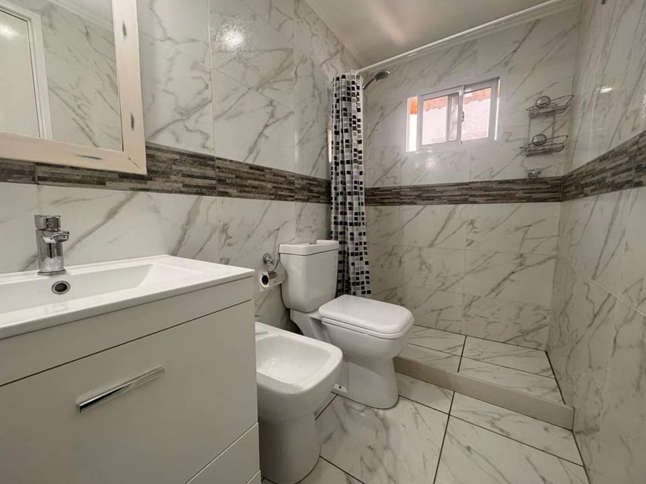 CASA EN PH 4 AMBIENTES CON COCHERA EN VENTA APTO CREDITO